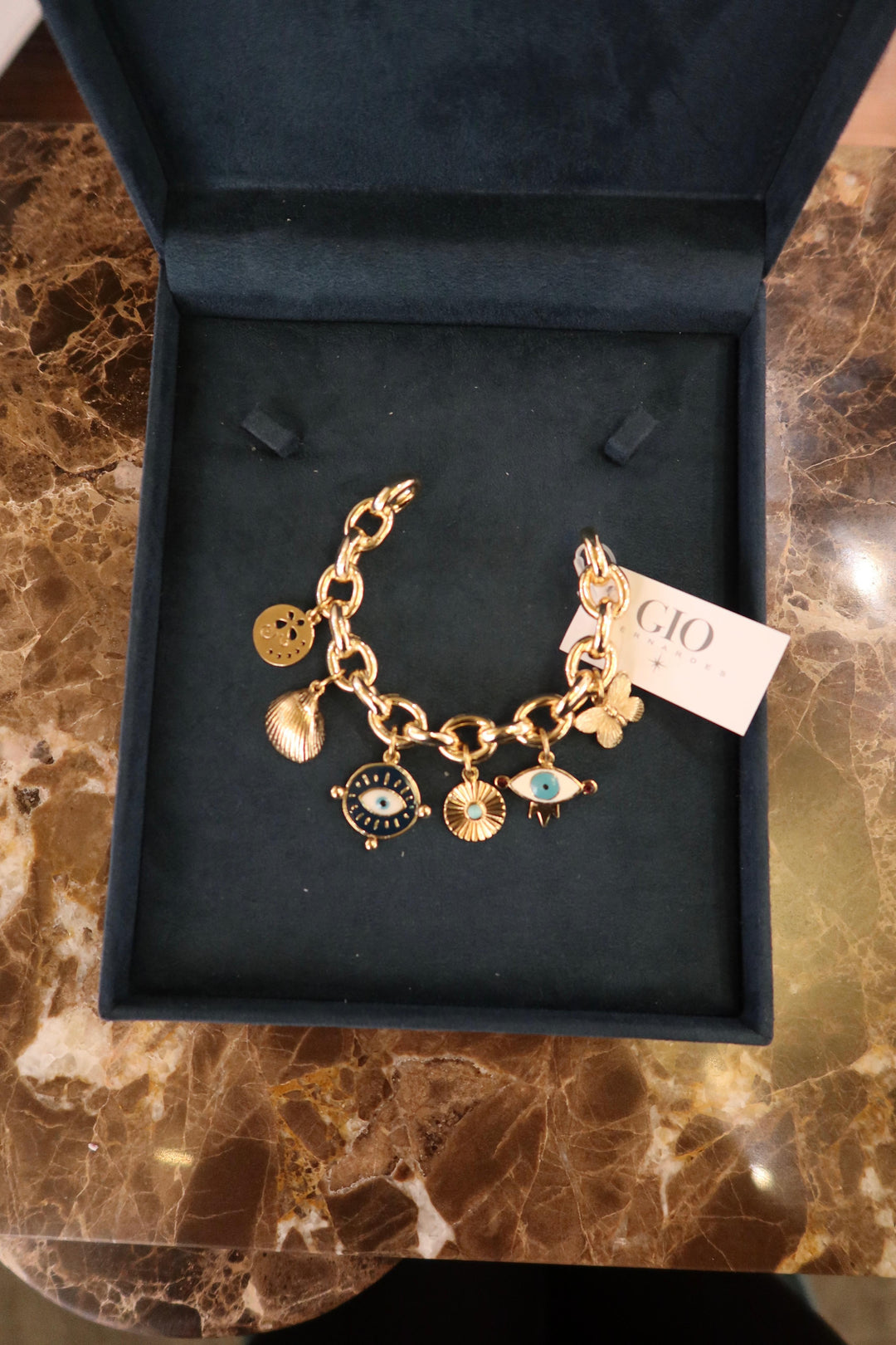 GOLD BRACELET WITH EYE PENDANTS