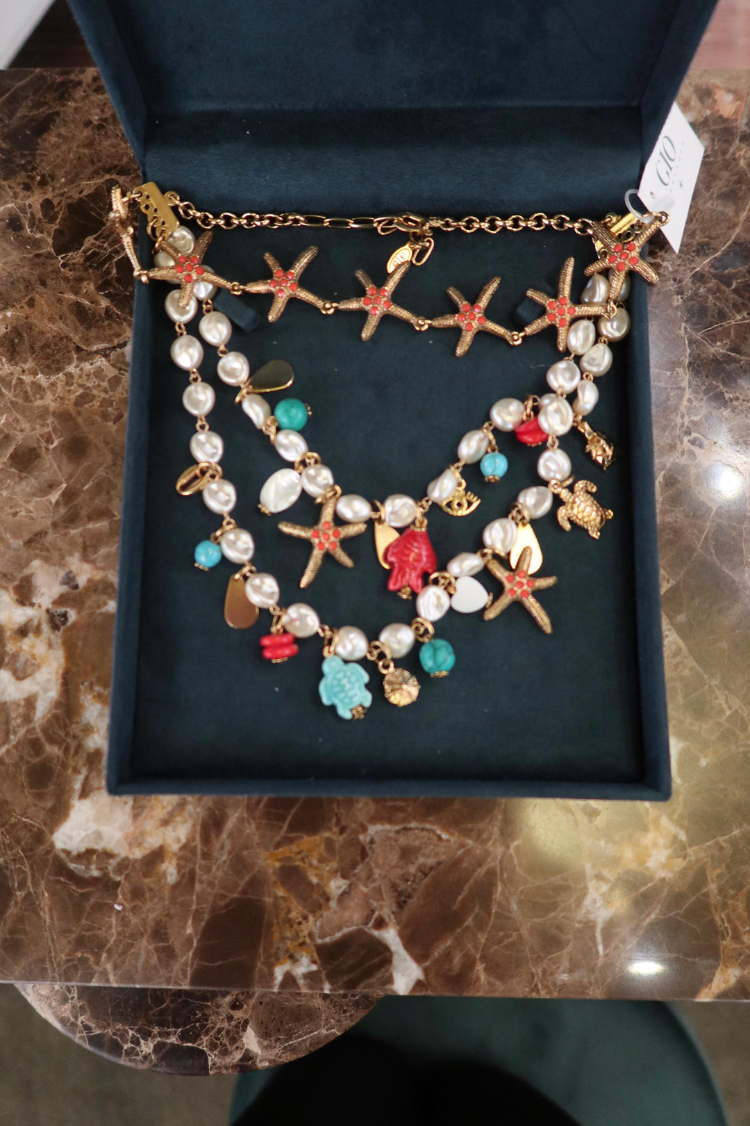 CORAL STAR NECKLACE