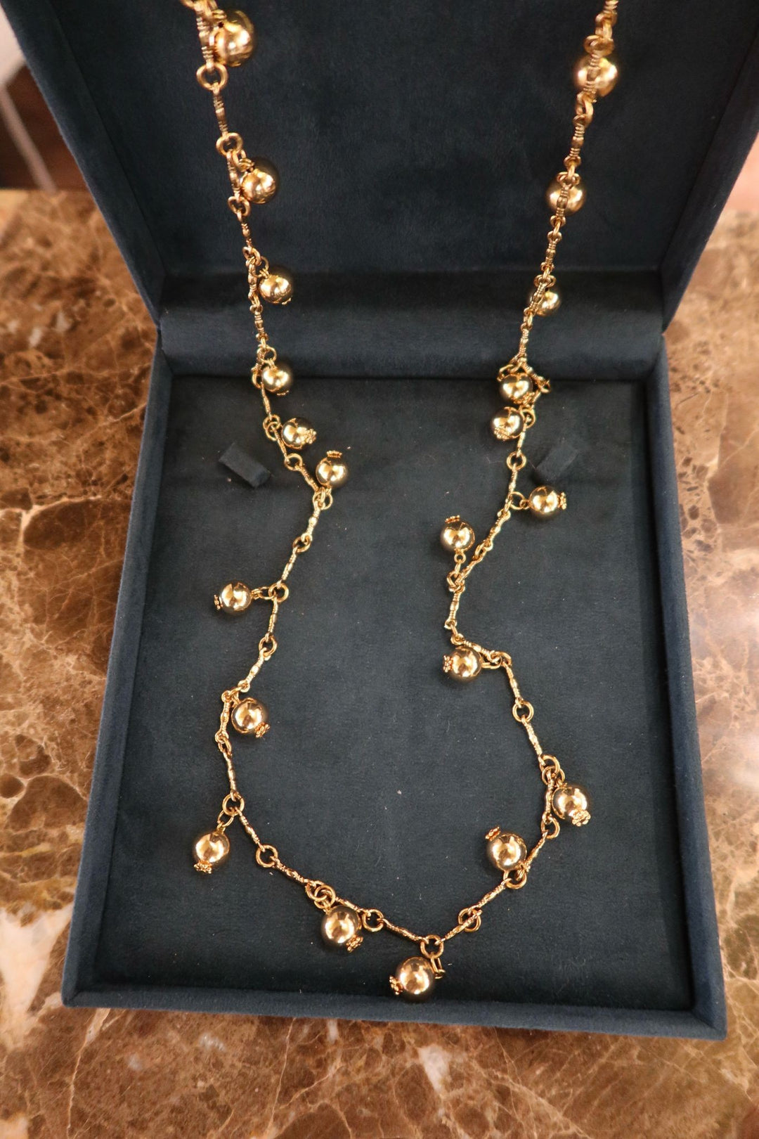 LONG GOLD NECKLACE WITH BALLS