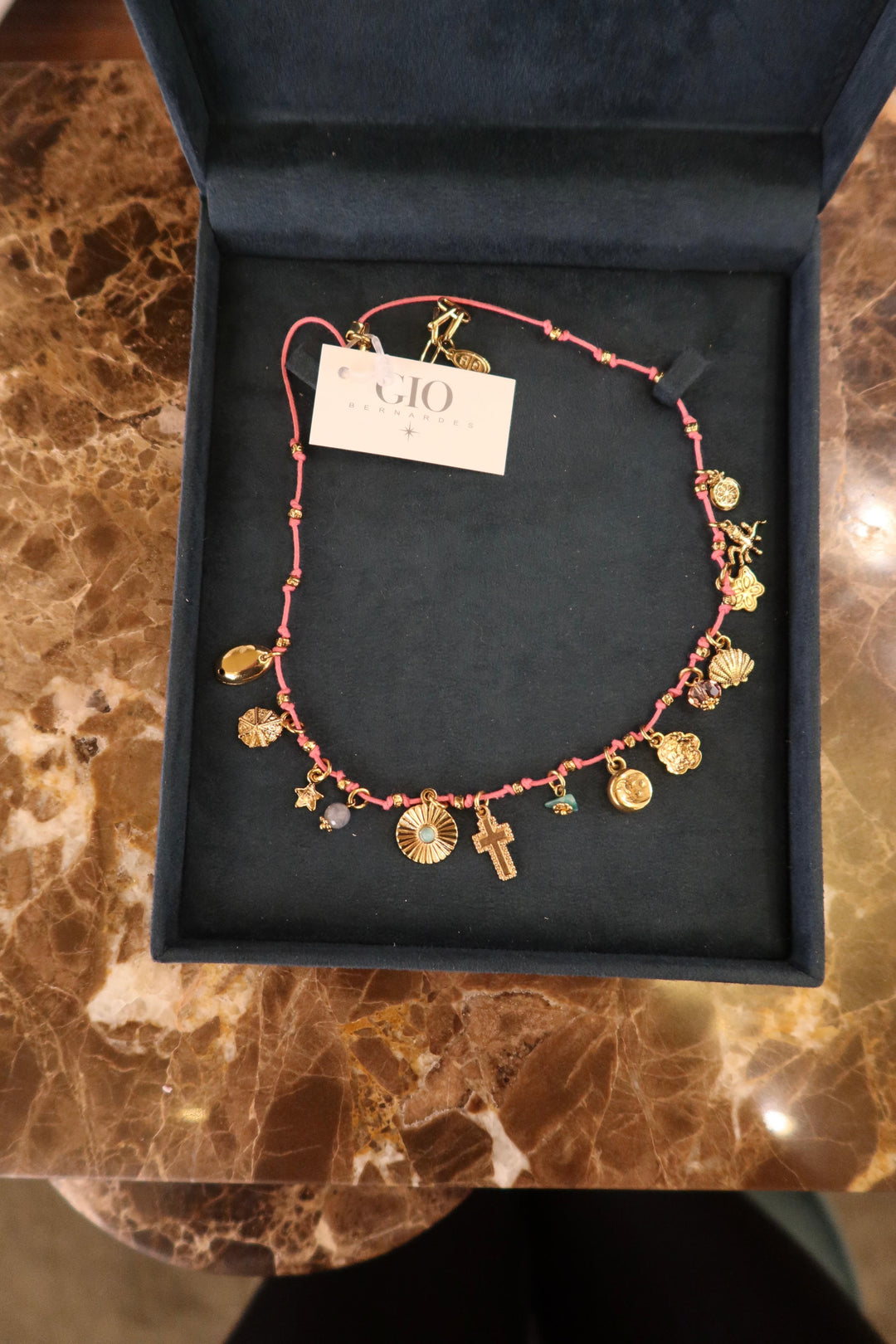 PINK CORD NECKLACE WITH CHARMS
