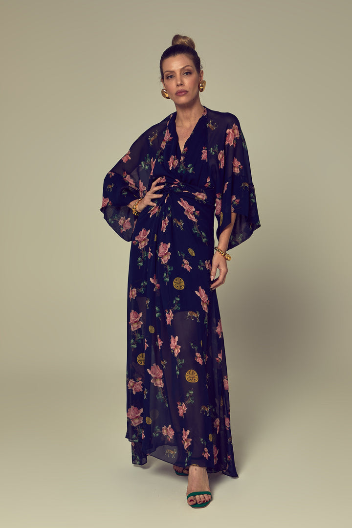 a navy blue kimono dress with a floral rose pattern