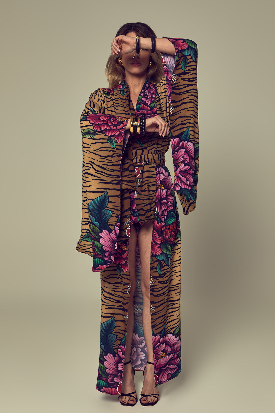 a long kimono with a combination of tiger stripe and floral print
