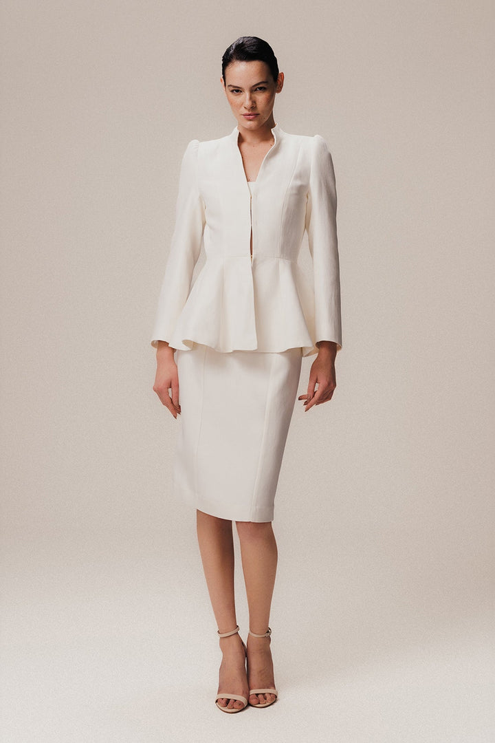 a long sleeve off white blazer with a tailored fit and structured shoulders