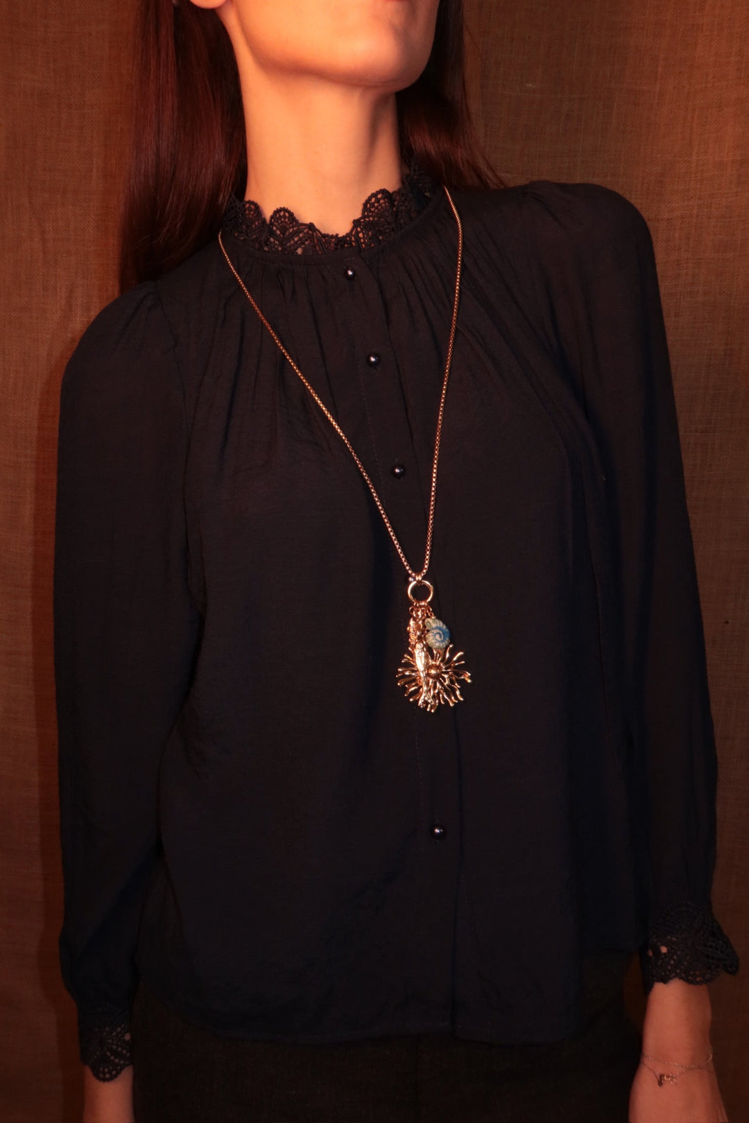 Collana lunga con pesce