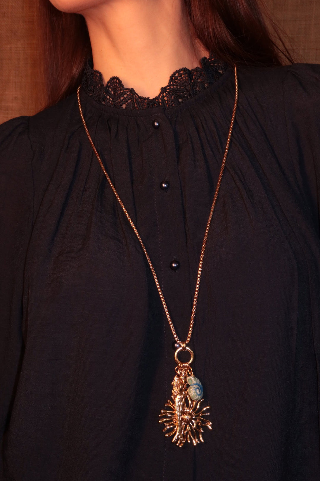 Collana lunga con pesce