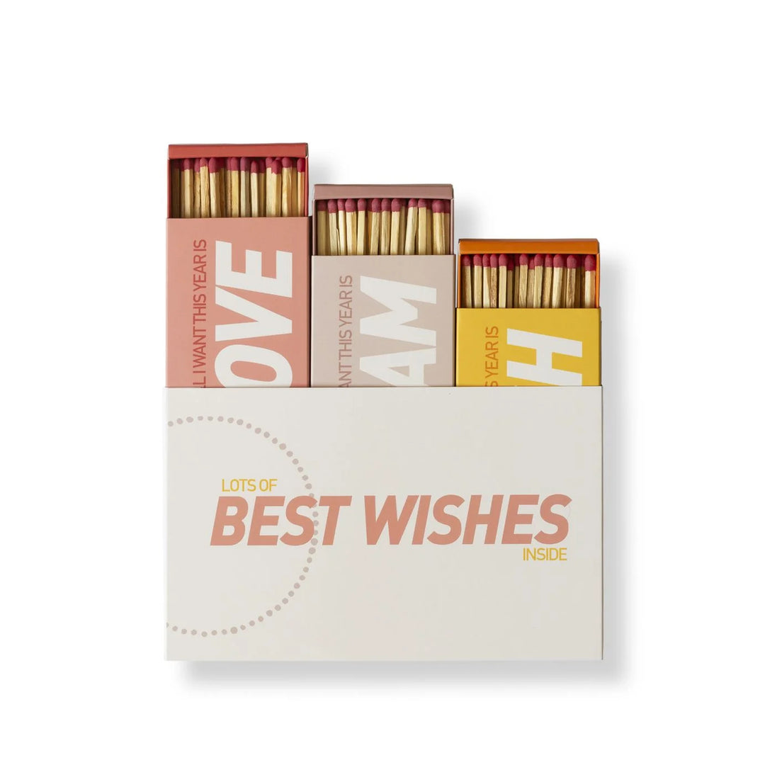 Matches with decorative packaging featuring text BEST WISHES
