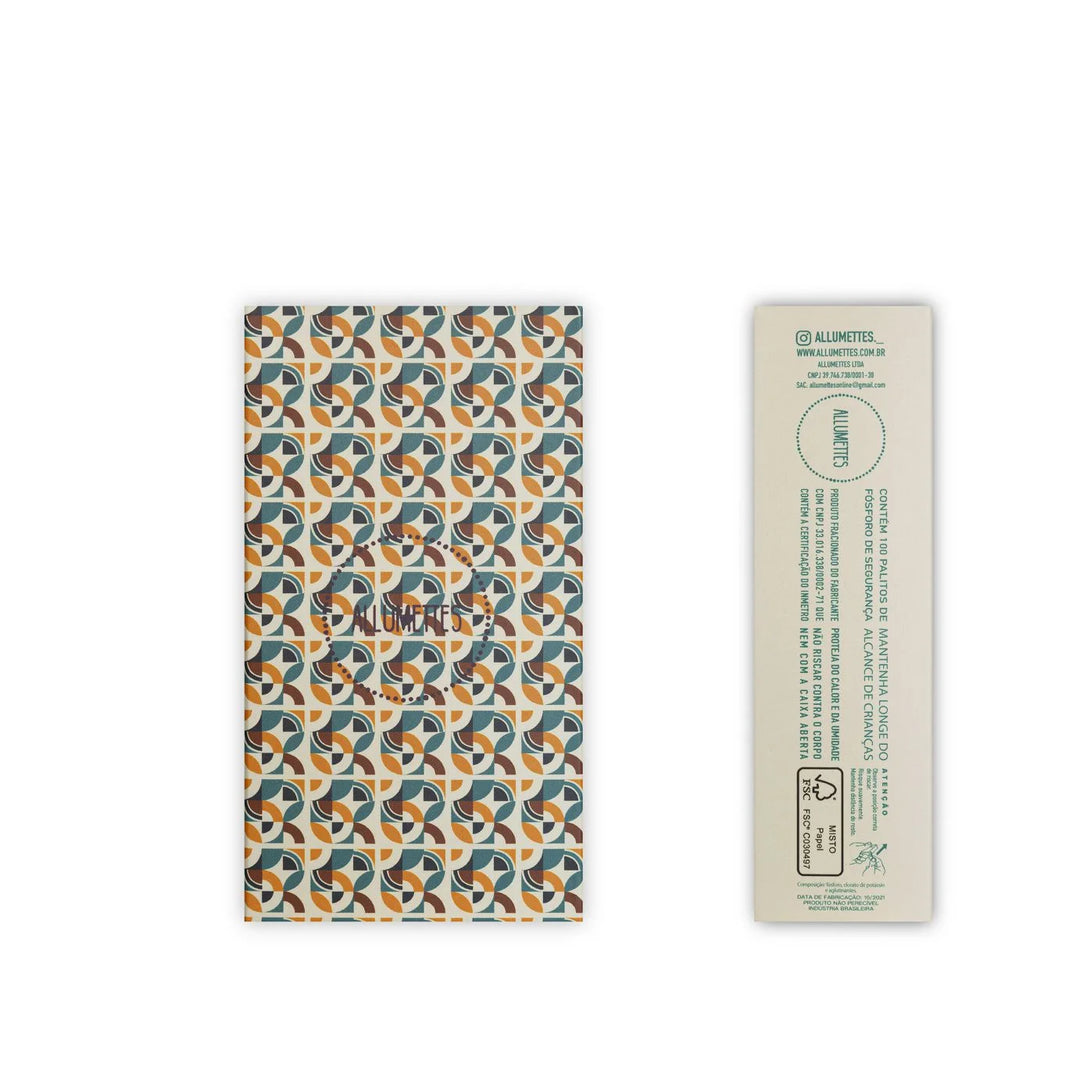 A matchbox with a matte finish design with geometric pattern, containing red safety matches.