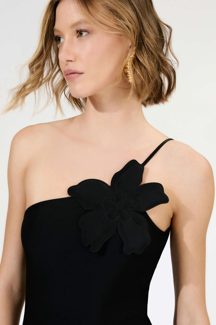 a black one-shoulder dress with floral details 